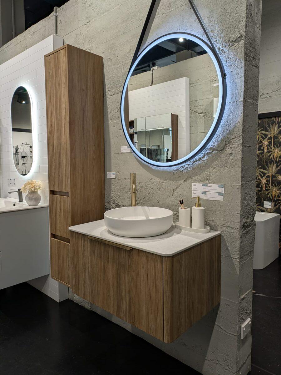 Timber vanity with a round hanging LED mirror