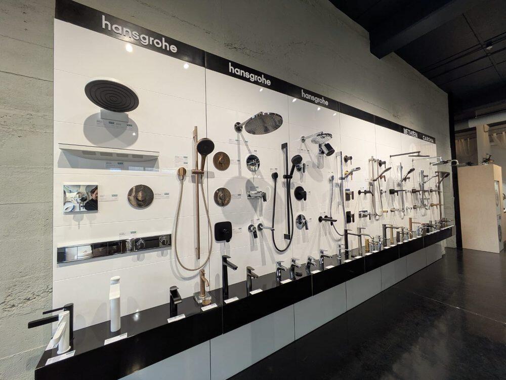 The hansgrohe brand wall in the Wellington Central showroom, showing showers, mixers and tapware
