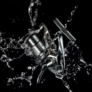 Shimano X Protect - Image of Reel being splashed with water