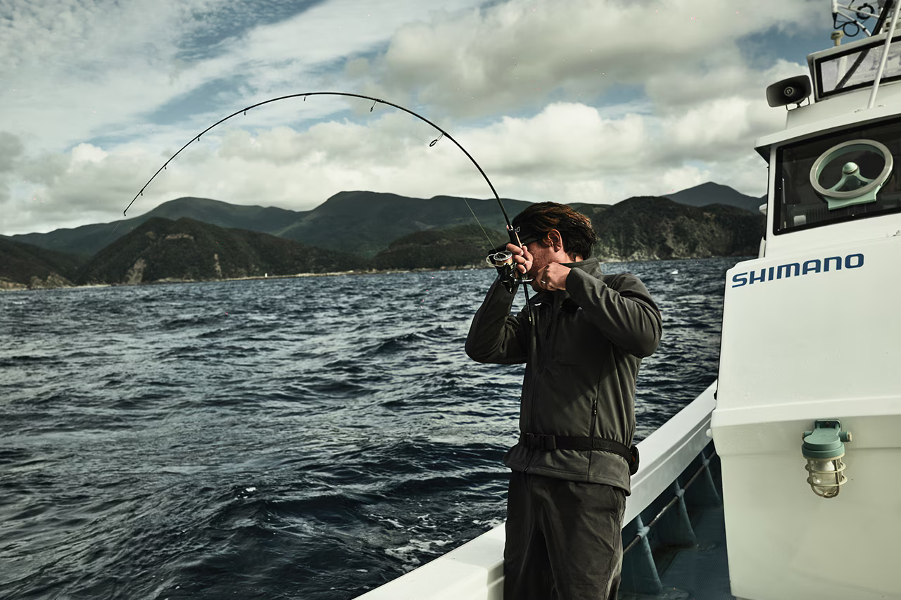 Shimano Twin Power XD FB Image of someone hooking up to a fish on a boat